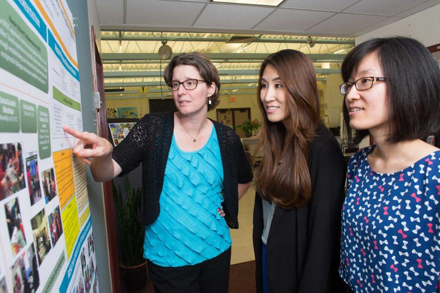Professor working with graduate students